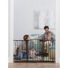 imageRegalo 58Inch Easy Step Extra Tall Arched Dcor Walk Thru Baby Gate Award Winning Brand Includes 4Inch Extension Kit 4 Pack Pressure Mount Kit and 4 Pack Wall Mount Kit Bronze