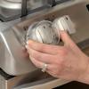 imageRegalo Safety Stove Knob Covers for Baby Proofing Child Proof Oven Knob Guards Easy Install Clear 5 Pack
